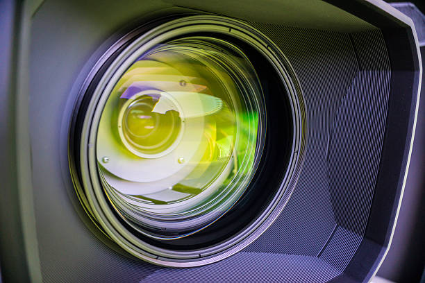 istock View of the glass elements in a camera lens. Objective 611901940