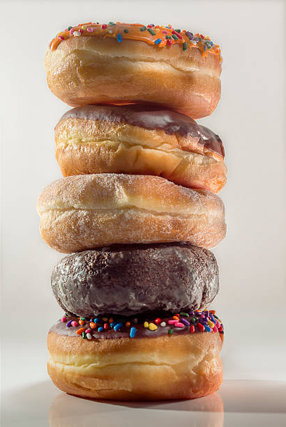 istock Five Donuts Stacked on Top of Each Other 611902184