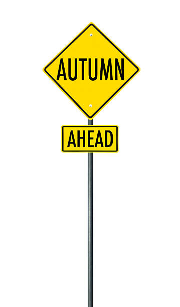 istock autumn alert road sign on white background 611903816