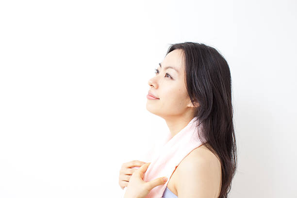 istock Woman with a towel around her neck 611995784