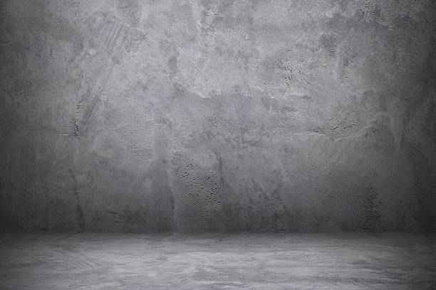 istock cement and concrete wall and floor with shadow 611995806