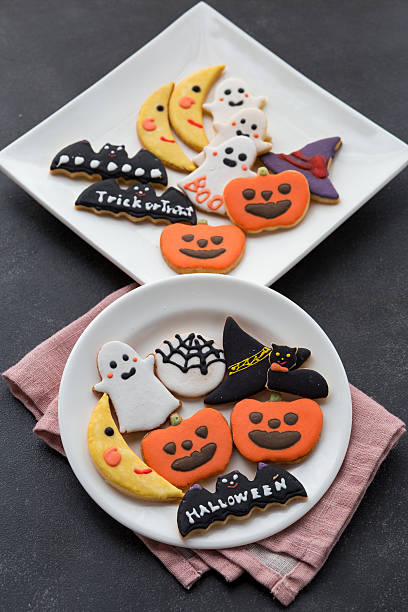 istock Halloween cookies on black background 611996066