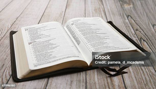 An Opened Bible On A White Distressed Wooden Table Stock Photo - Download Image Now - Psalms, Bible, Backgrounds