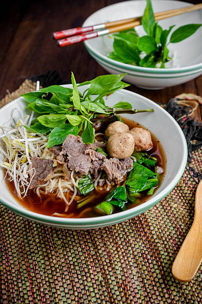 istock asian noodle soup with beef meatball with fresh vegetable 611999518