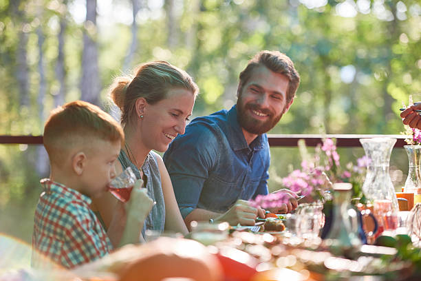 istock Family dinner outdoors 611999872