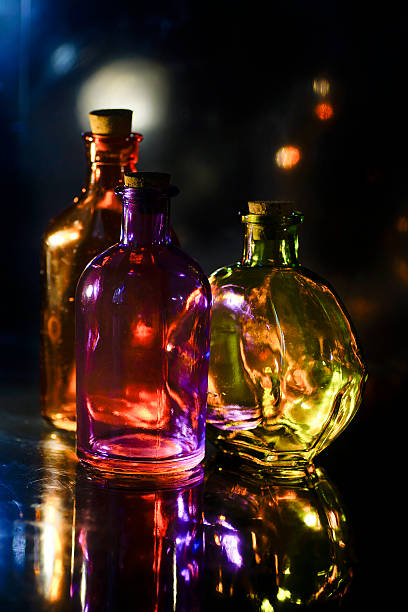 istock Magic love witch brew potion colorful glasses bottles 612002992