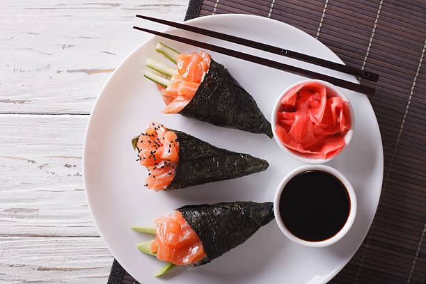 istock Japanese food: Salmon temaki closeup. horizontal top view 612003050