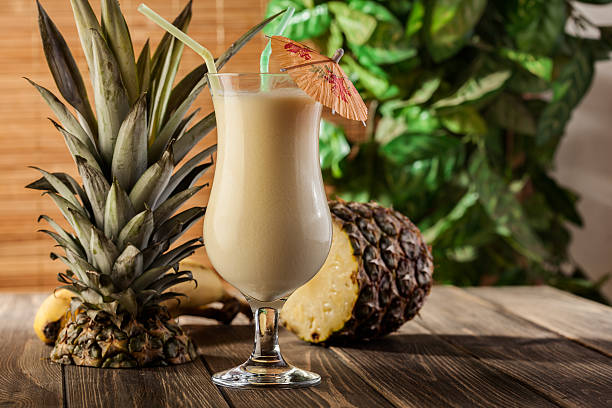 Pina Colada over wooden background stock photo