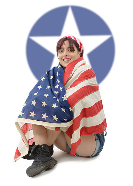 istock beautiful young woman dressed with american flag 612004362
