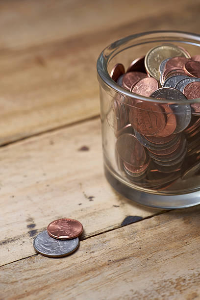 istock Cash Jar Filled with Cash Donations 612005414