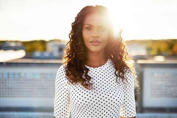 istock Beautiful woman standing outside 612006350