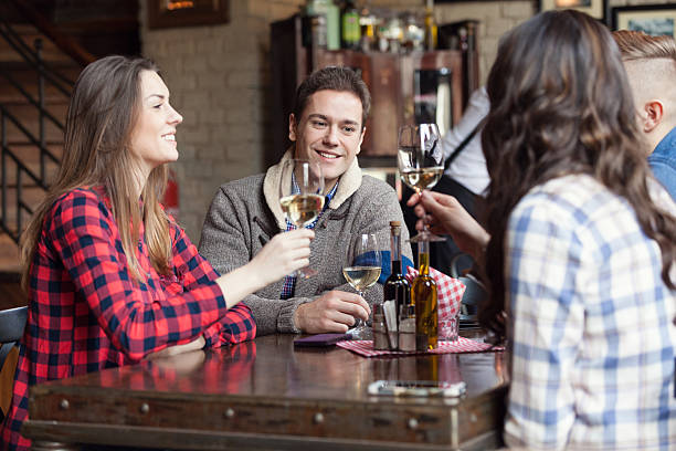 istock Friends toasting with wine glasses 612008206