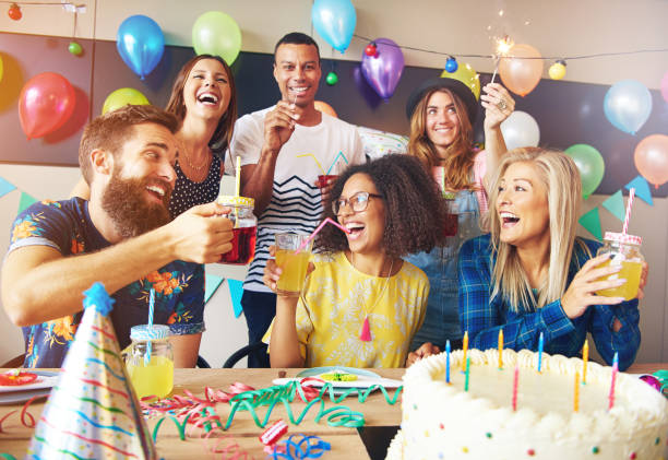 istock Happy exuberant group of friends celebrating 612008904