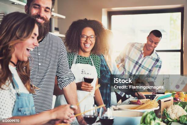 Group Of Diverse Friends Drinking And Cooking Stock Photo - Download Image Now - Cooking, Learning, Friendship