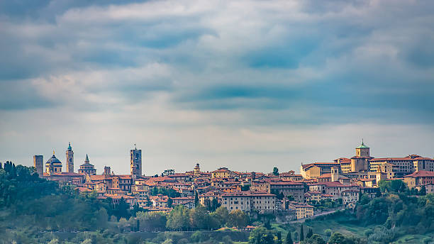 View of Bergamo Alta View of Bergamo Alta town with walls bergamo stock pictures, royalty-free photos & images