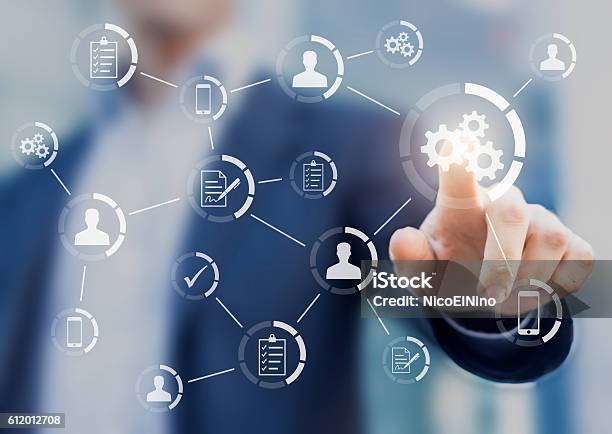 Automation Of Business Workflows And Processes With Businessman Stock Photo - Download Image Now