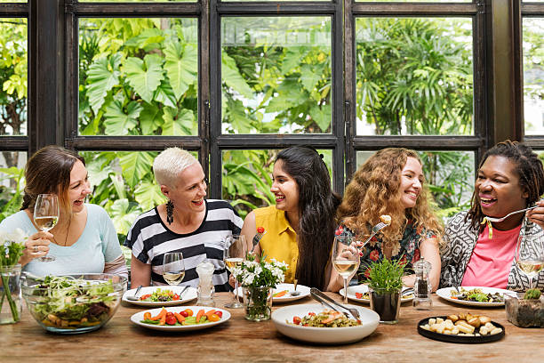 istock Diversity Women Group Hanging Eating Together Concept 612014568