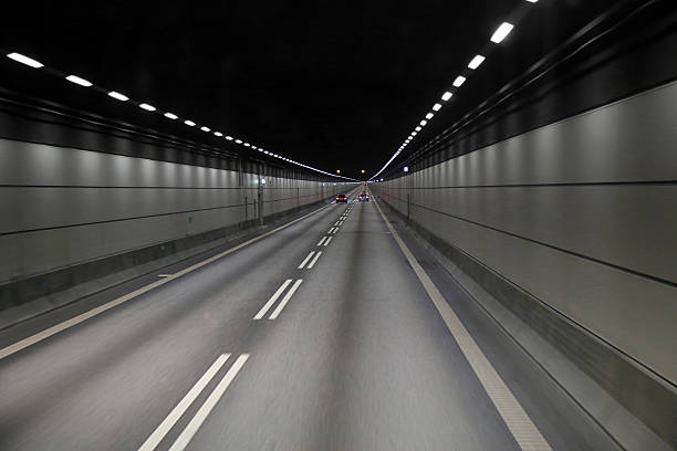 Cars in a tunnel on Oresund bridge between Sweden stock photo