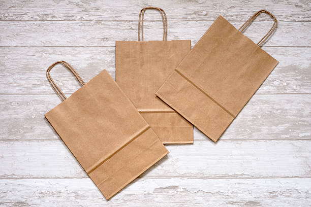 three craft bags wooden floor stock photo