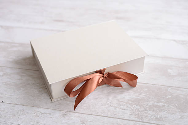 white packaging box gift with chocolate brown tape stock photo