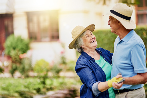 Cropped shot of an affectionate senior couple dancing in their backyard