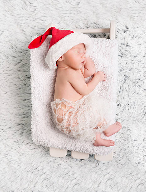 istock sweet newborn baby in red hat 612019094