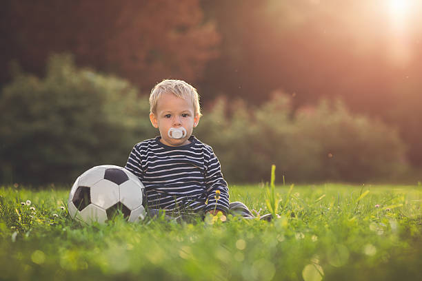 istock Toddler and the ball 612019442