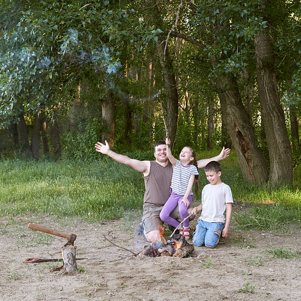istock people camping in forest, family active in nature 612019476