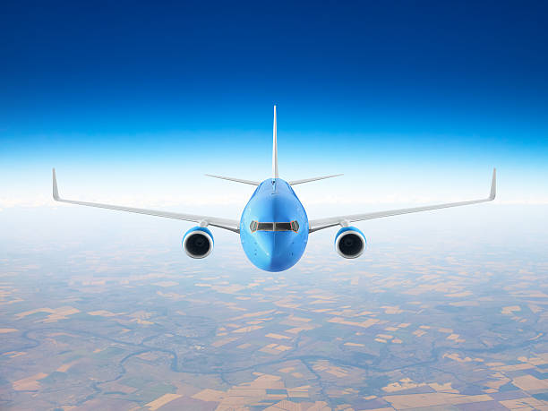 istock Passenger airplane flying over the earth 612021016