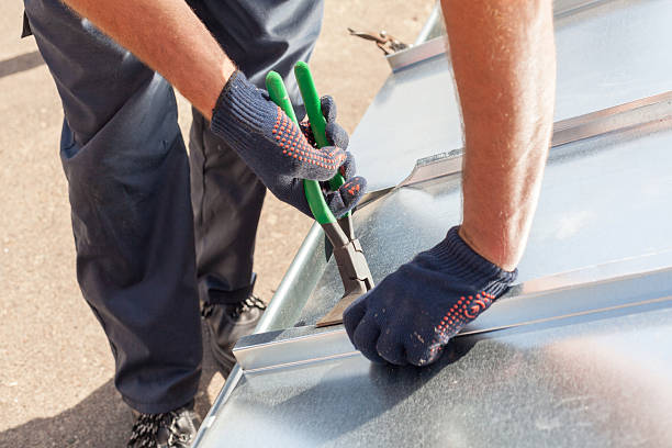 istock Roofer builder worker finishing folding a metal sheet 612021872