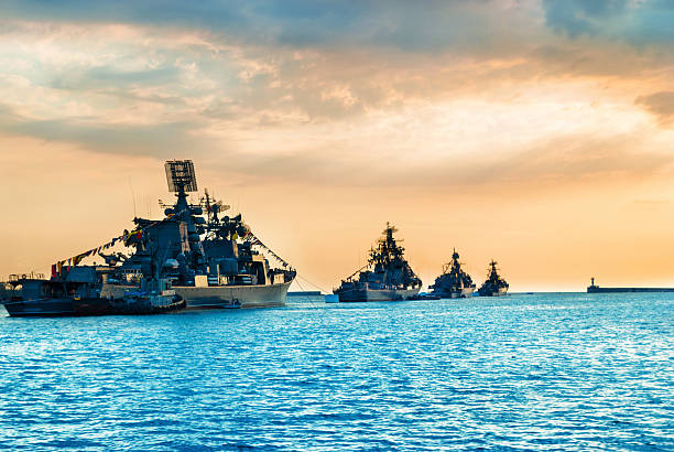 istock Military navy ships in a sea bay 612022406