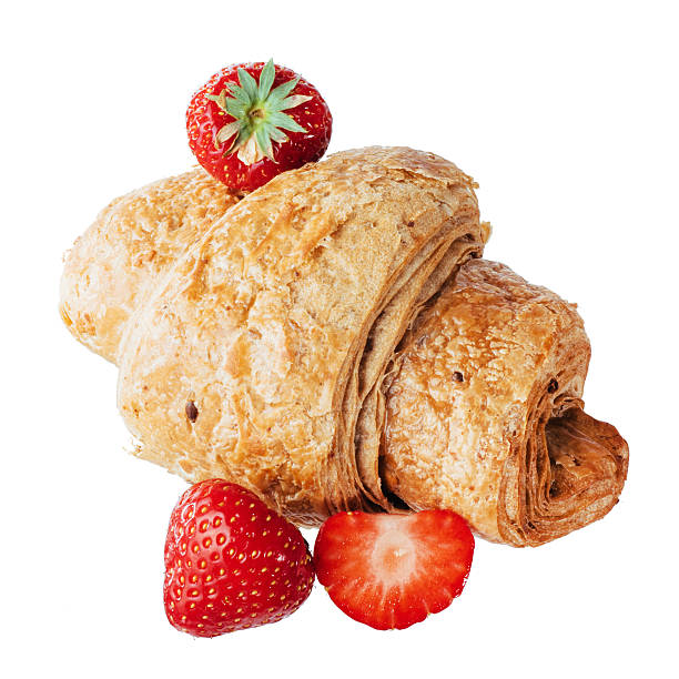Isolated image of delicious bagels with strawberries closeup