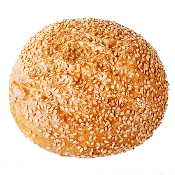 istock bun sprinkled with sesame seeds on a light background. 612023656