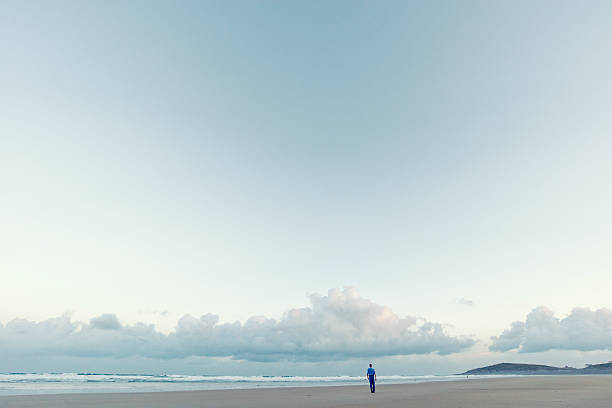 istock Solitude, sunrise walk along Fistral Beach, Newquay, Cornwall. 612026938