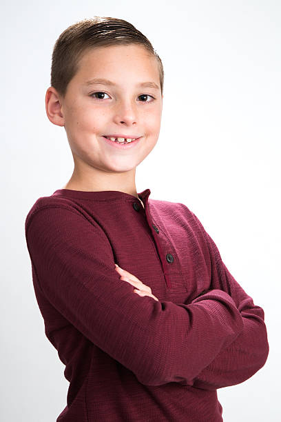 Confident young boy medium portrait stock photo
