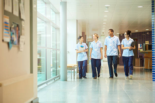 istock young nurses on their way to ward 612027286