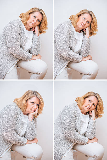 mujer adulta compuesta con expresión facial triste - mature adult sadness overweight women fotografías e imágenes de stock