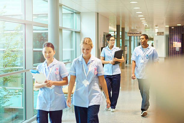 istock young nurses on their way to ward 612027776