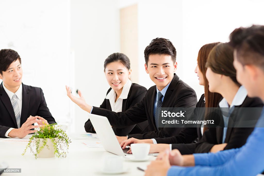 Group of happy young business people in  meeting Japanese Ethnicity Stock Photo