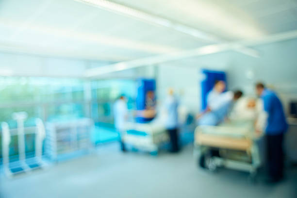 Cropped Hand Of Patient With Medical Equipment In Hospital