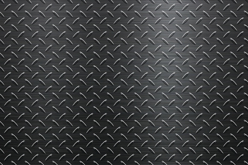 Background of metal diamond plate in black color can be used for design.