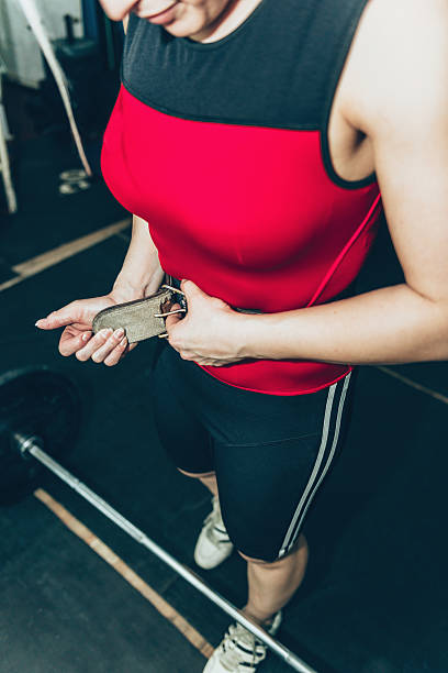istock Female weightlifter getting ready 612223368