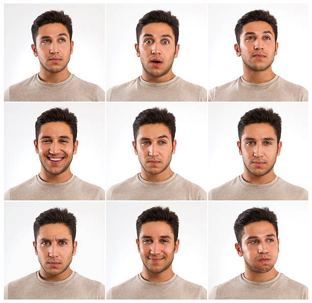 istock Face Expressions of A Young Man 612224358