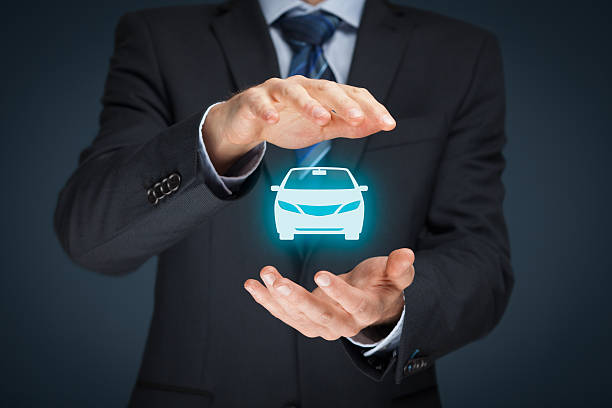 Car insurance Car (automobile) insurance and collision damage waiver concepts. Businessman with protective gesture and icon of car. shield photos stock pictures, royalty-free photos & images