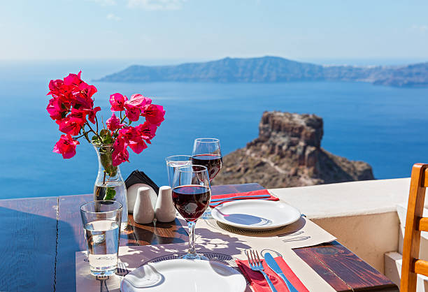 istock Two glasses of red wine on the table 612226424