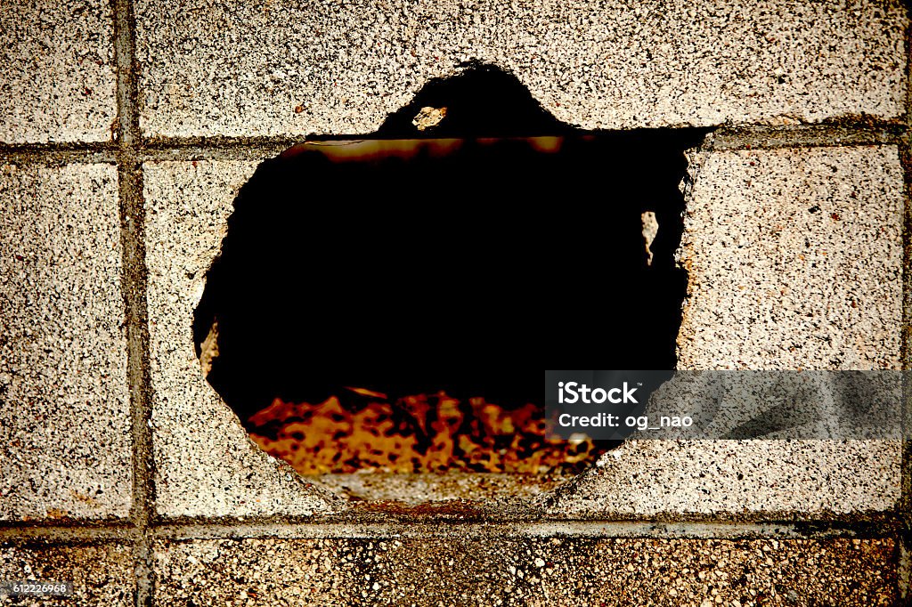 Hole Concrete Wall Stock Photo