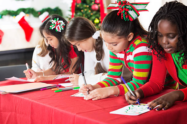istock Fun friends create Christmas cards 612228866