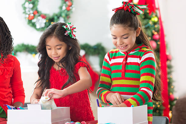 istock Young friends enjoy working on charity project 612229872