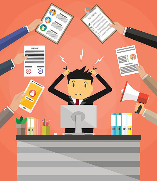 istock businessman in pile of office papers 612230534