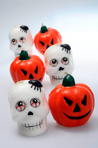 istock Halloween pumpkins and skulls 612231044
